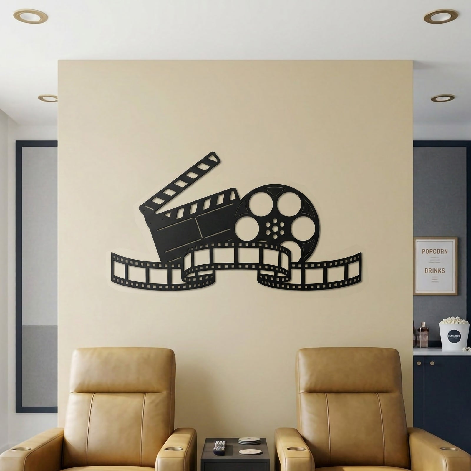 Satin black movie reel and clapperboard metal wall art above home theater seats