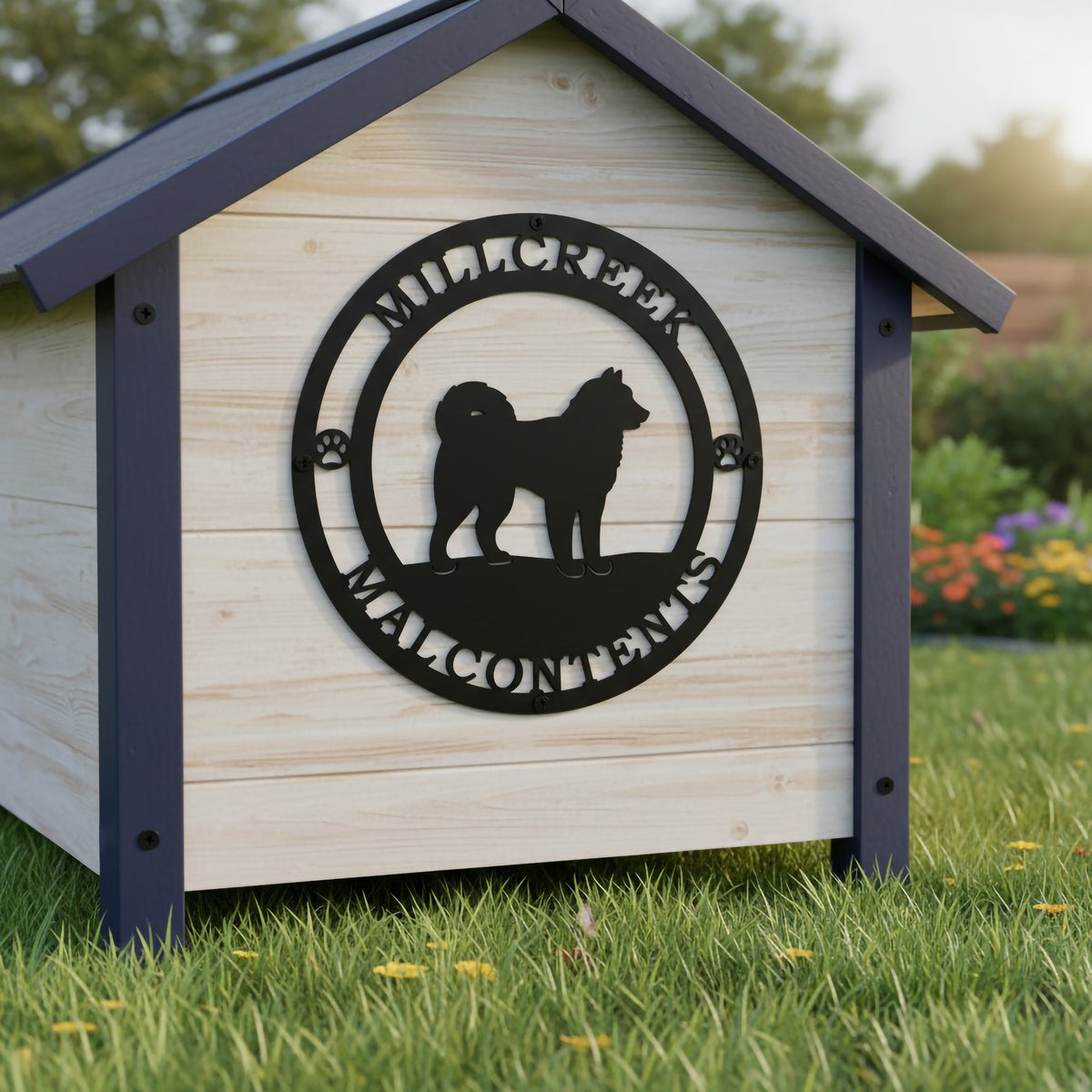 Black Mill Creek Malcontents dog metal sign displayed on an outdoor wooden dog house with grass background