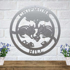 Silver chipmunk hollow metal wall art with woodland animal and tree design mounted on white brick wall rustic cabin decor