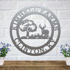Silver custom deer cabin metal sign with woodland tree scene and personalized family name decor