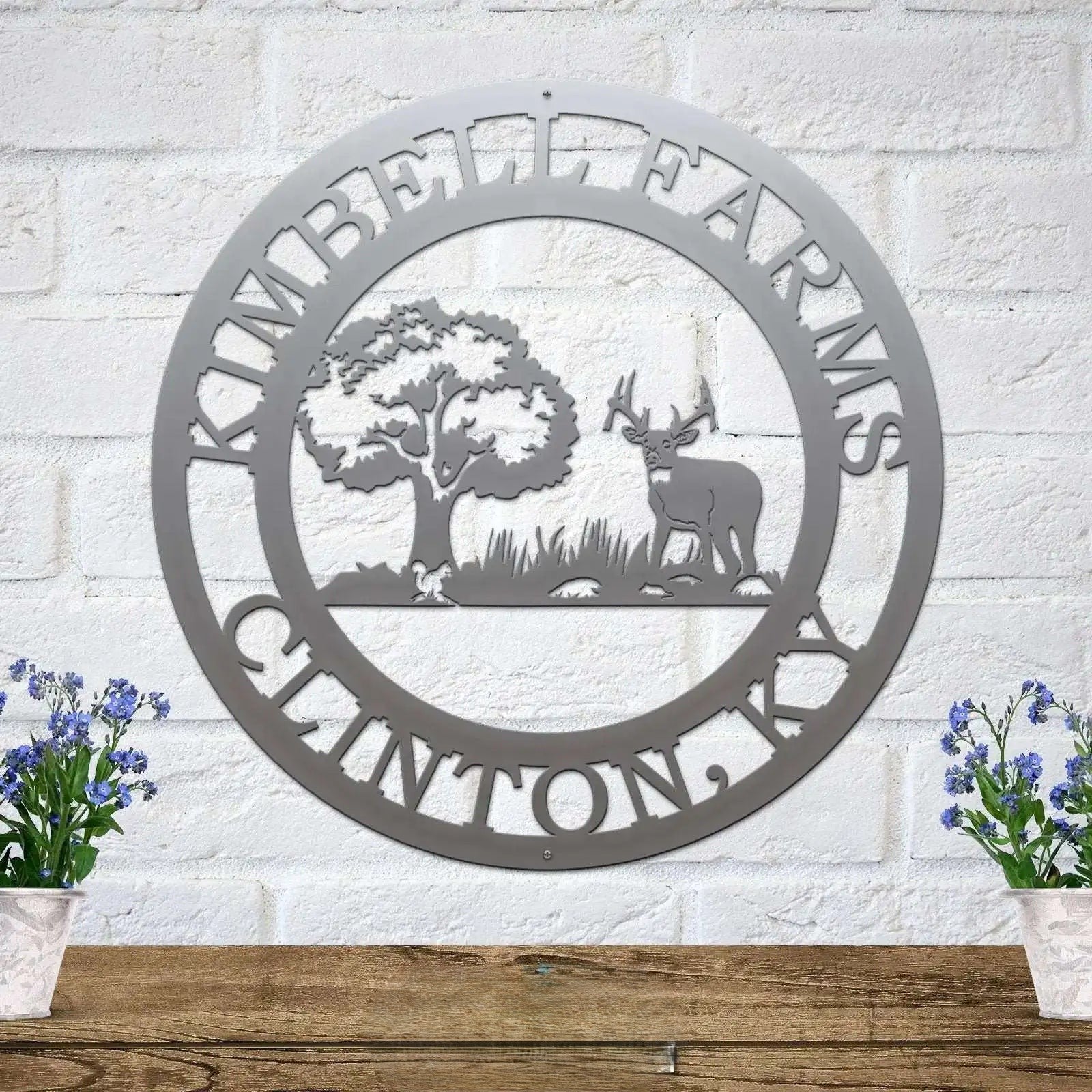 Silver custom deer cabin metal sign with woodland tree scene and personalized family name decor