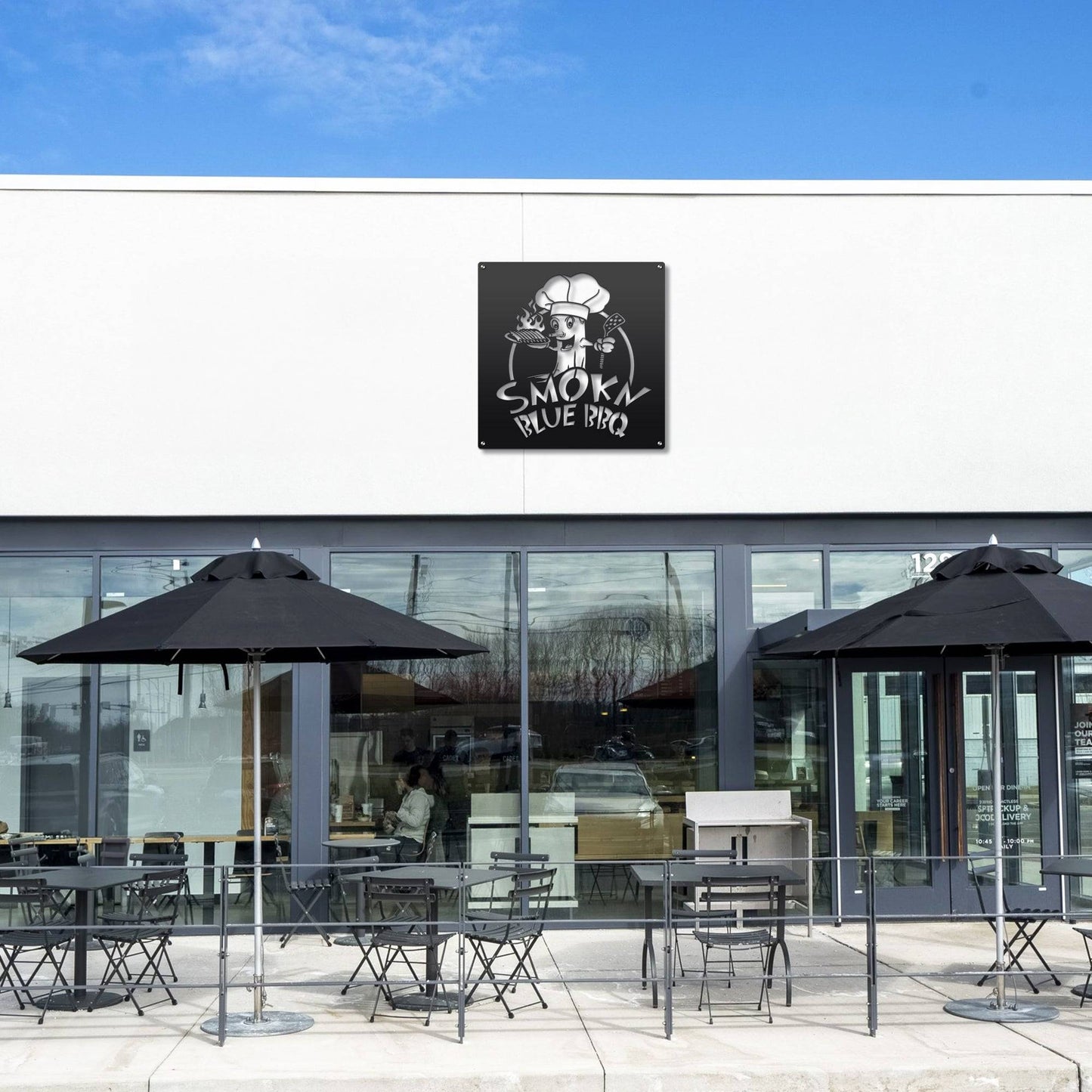 Custom STOREFRONT Brand/Business Logo Sign displayed outside a building with tables and umbrellas, showcasing its versatility for professional environments like office doors or lobbies.