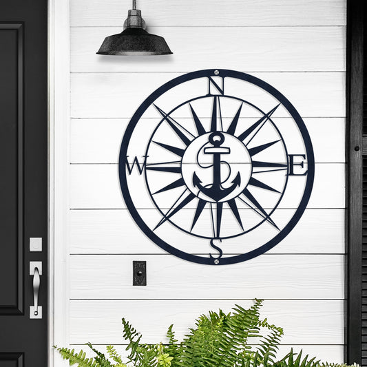 Personalized GPS & Location Anchor Compass Sign featuring a metal compass and anchor design on a white wall, ideal for enhancing nautical decor in a home or boat setting.