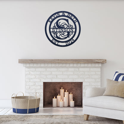 Couple's Monogram Established Sign displayed above a fireplace with candles, showcasing personalized family name decor. This metal wall art serves as a custom wedding gift and home decor piece.