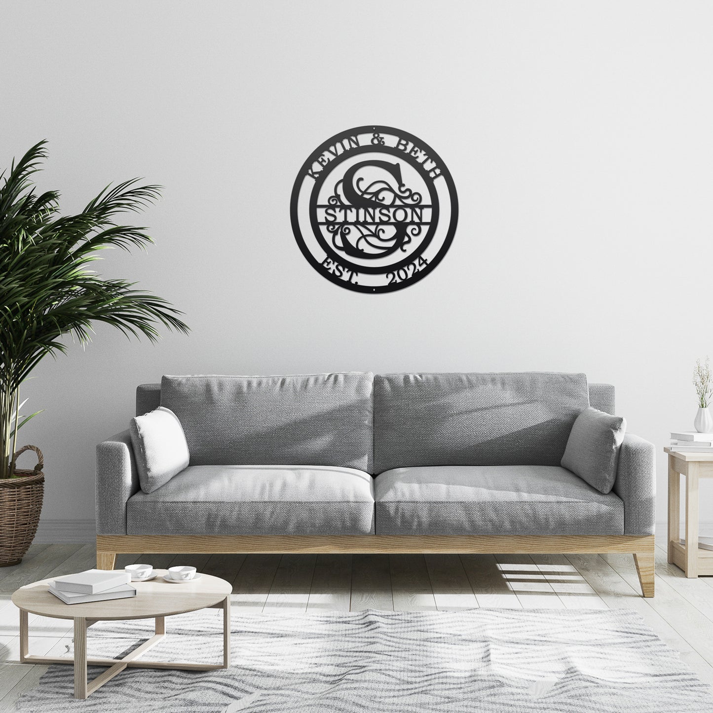 Couple's Monogram Established Sign displayed in a stylish room setting, featuring a personalized family name design on a black metal sign, complementing the interior decor with elegance.