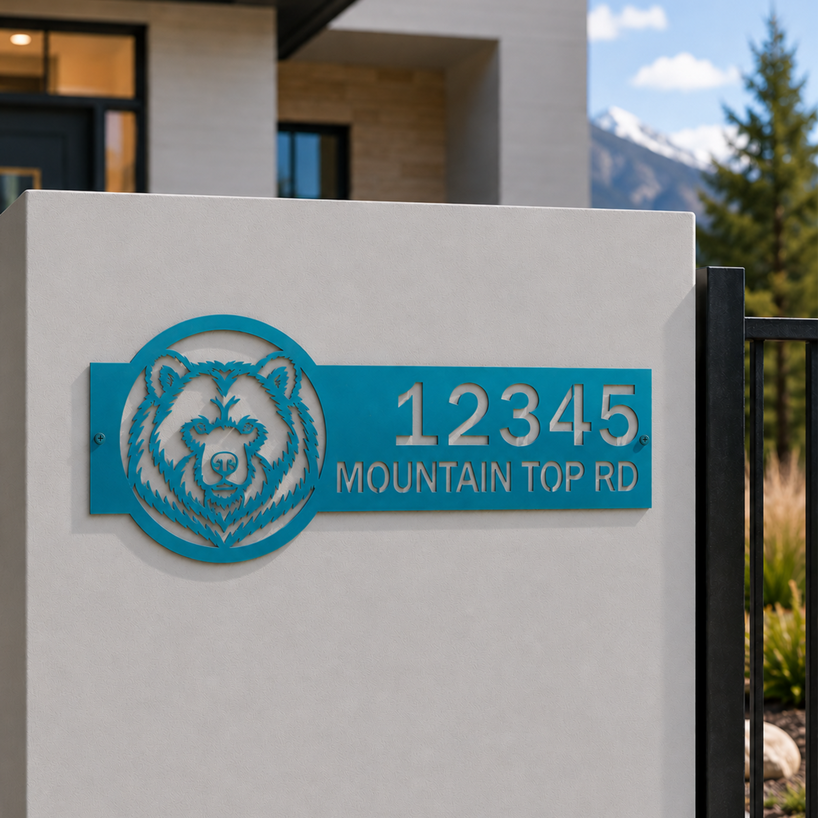 Turquoise personalized bear metal address sign with custom house numbers displayed on modern outdoor entry wall