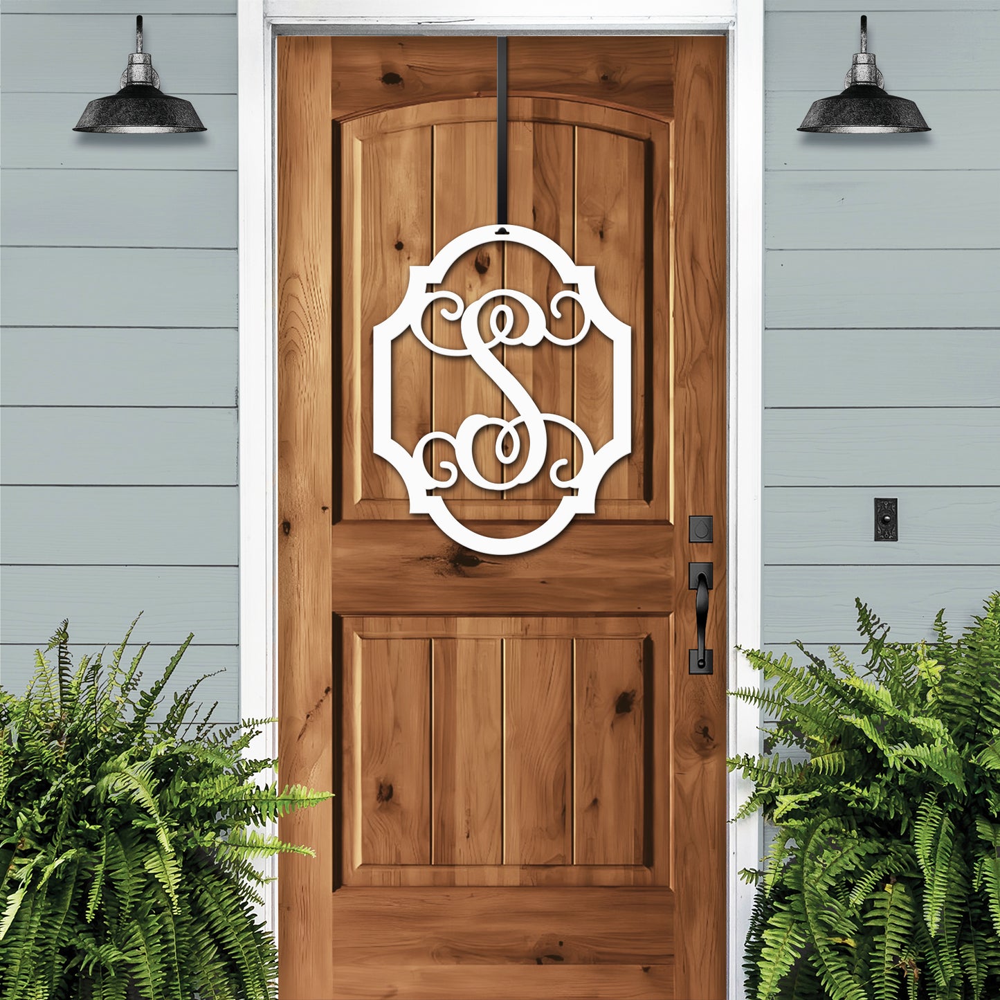 Couple's Monogram Established Sign - Personalized Family Name Sign displayed on a wooden door, featuring a white monogram. Ideal for weddings or housewarming, crafted from durable American-grade steel by HouseSensationsArt.