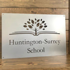 Custom rectangular LED office and storefront metal sign featuring “Huntington-Surrey School” with tree graphic, ideal for school branding, outdoor signage, and professional display.