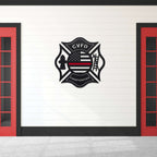 Firefighter Maltese Cross emblem with “CVFD” lettering and American flag design mounted on white wall with red doors, personalized décor, HouseSensationsArt