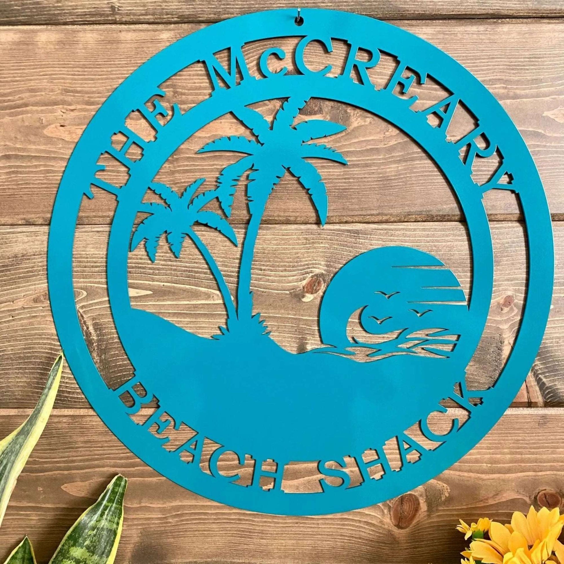 Vibrant metal beach sign with sunset and custom name perfect for outdoor patio or beach home