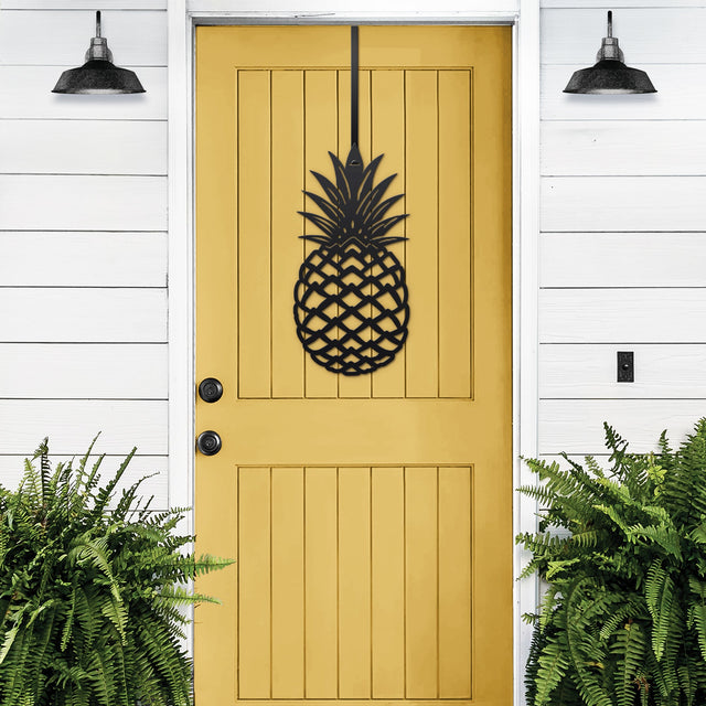 Black Welcome Pineapple Front Door Sign on yellow door – contrast front door decor