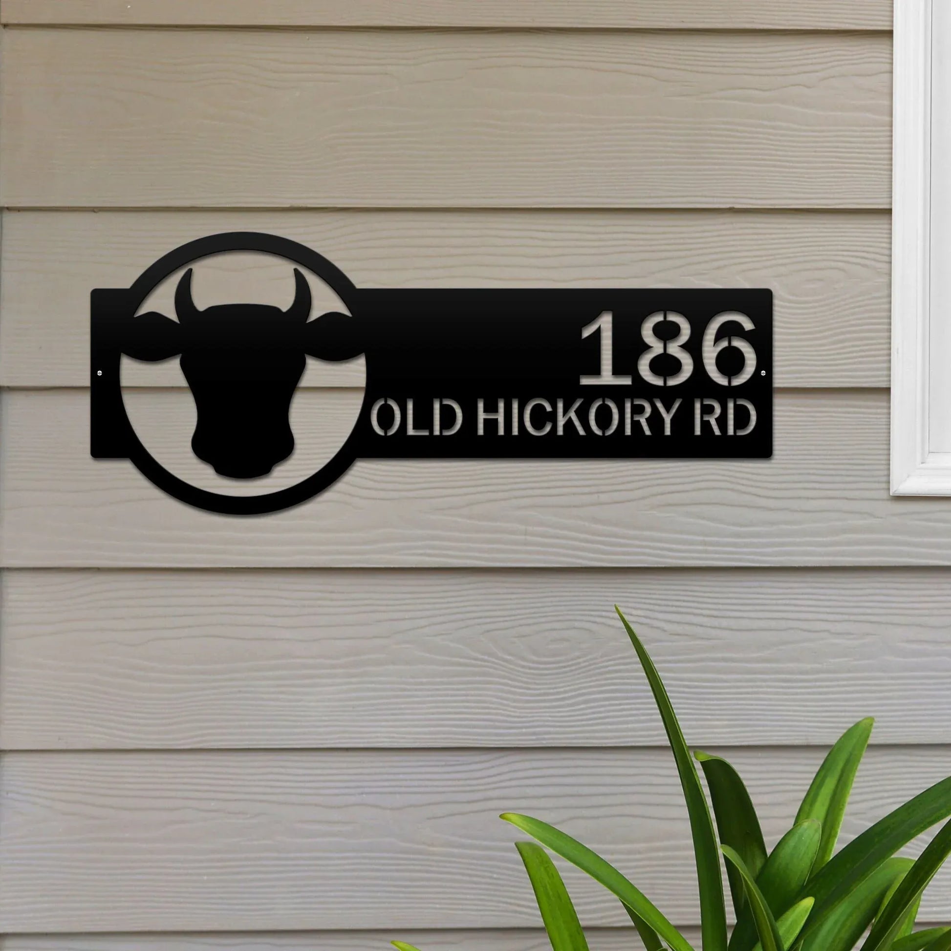 Black Cattle Farm Monogram Address Sign featuring a cattle head on the right and house number '186 Old Hickory Rd' on the left.