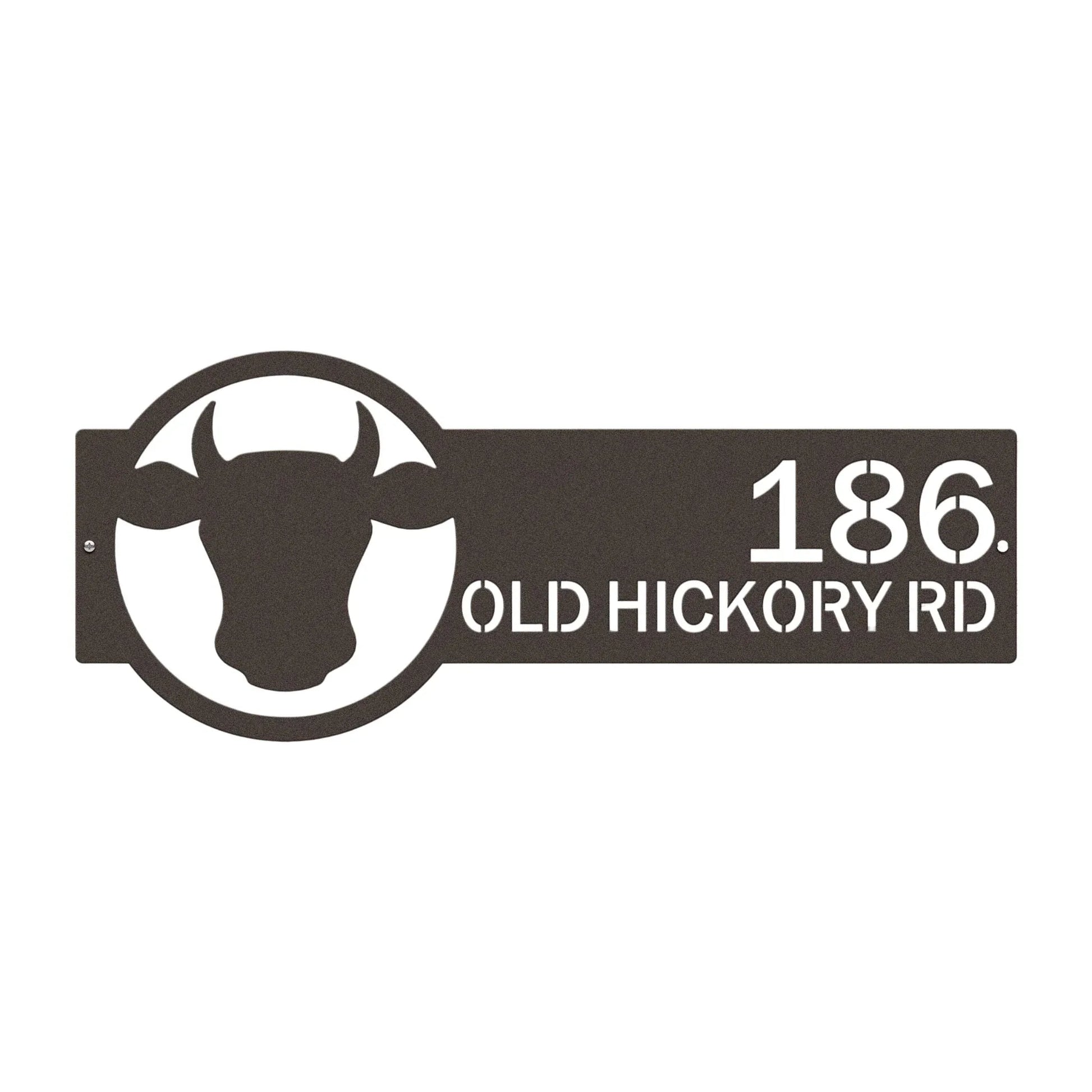 Close-up of oil-rubbed bronze address sign featuring cattle head emblem on the right and house number '186 Old Hickory Rd' on the left.