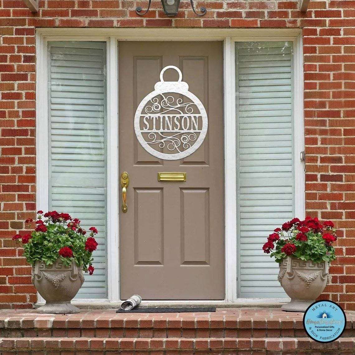 Christmas metal ornament with “STINSON” on front door, personalized holiday décor, outdoor festive metal sign, seasonal porch decoration