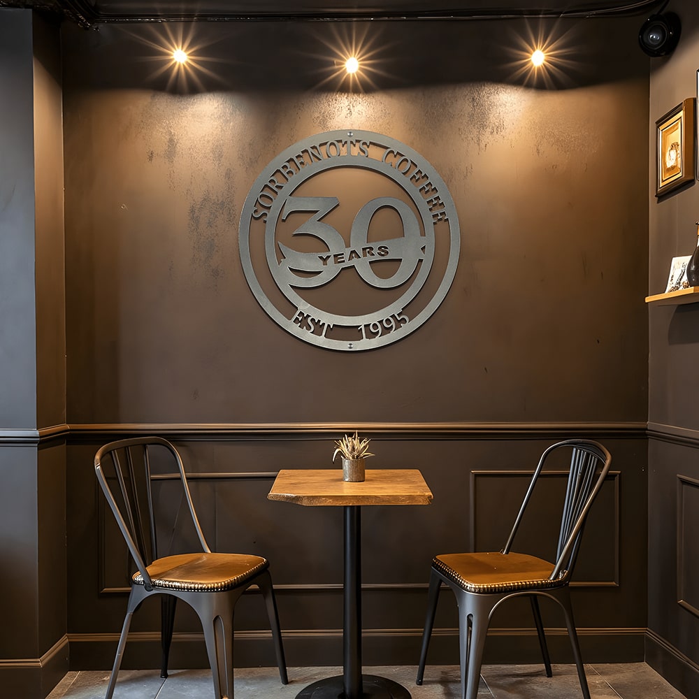 Custom metal business anniversary sign reading “30 Years,” decorative wall art displayed on brown restaurant wall, personalized milestone décor, HouseSensationsArt