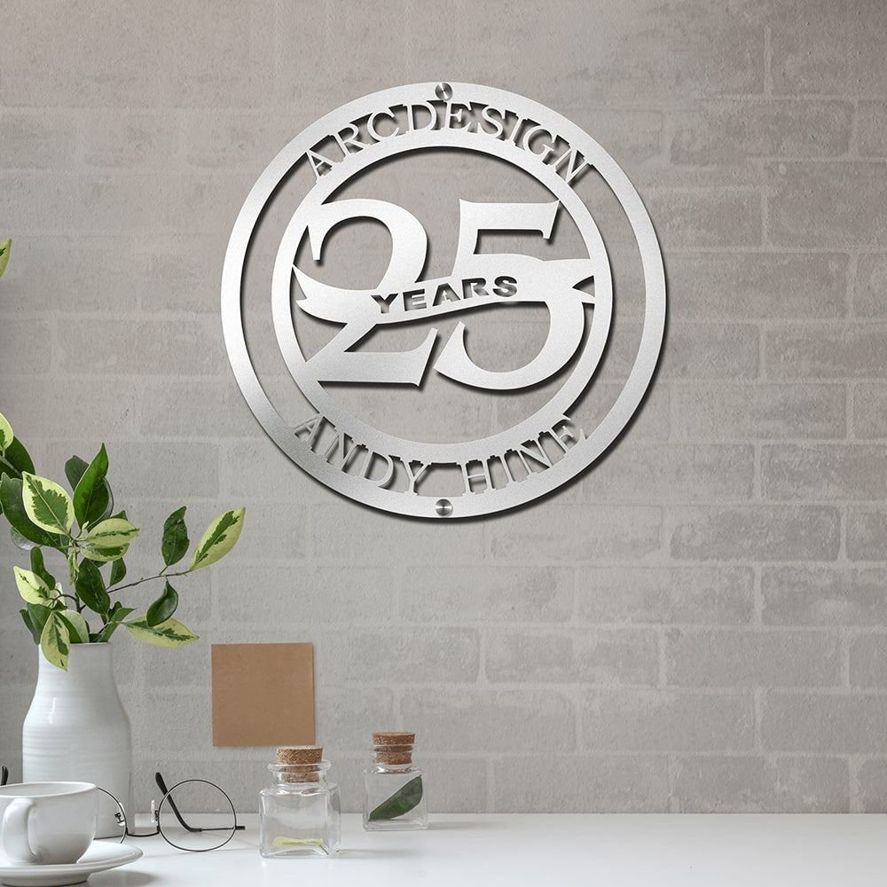 Custom metal business anniversary sign reading “25 Years,” decorative wall art displayed on gray brick wall, HouseSensationsArt