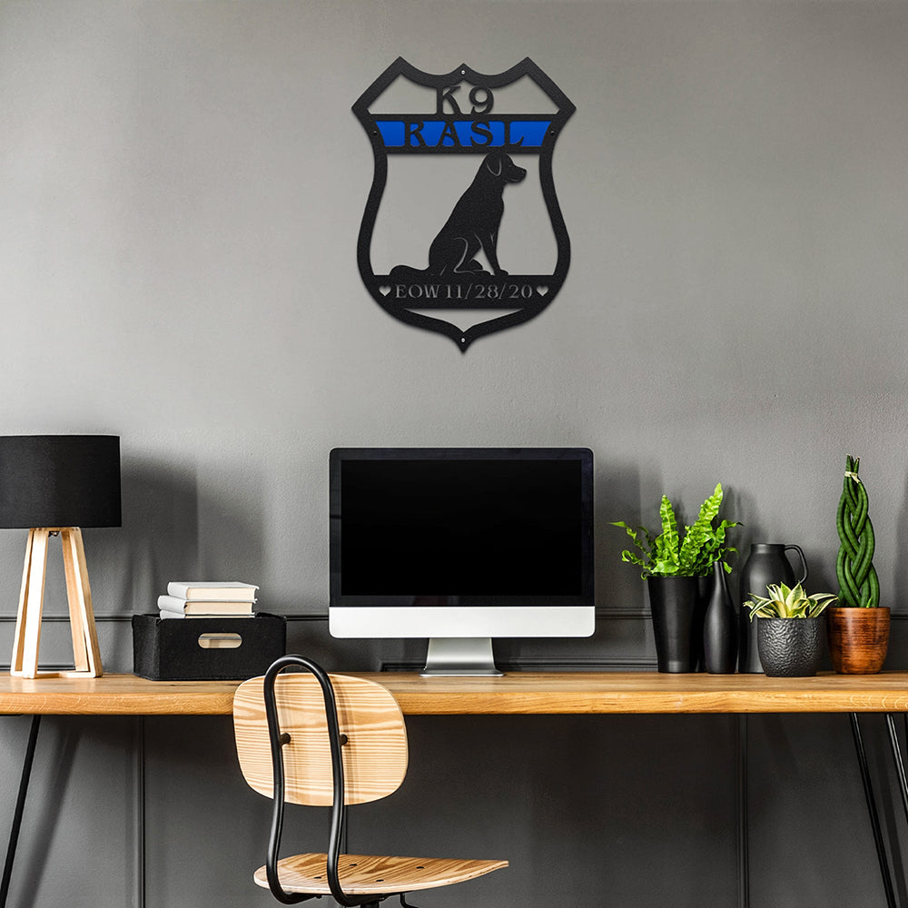 Decorative wall art displayed above a desk with a computer setup, creating a modern and stylish workspace environment.