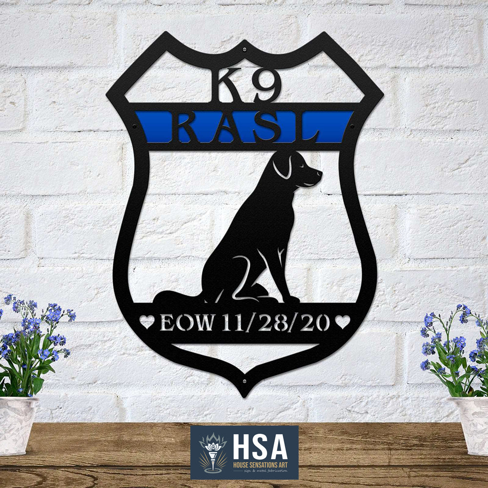 Decorative metal sign featuring a K9 RASL design mounted on a white brick wall, showcasing bold styling and durable metal craftsmanship.