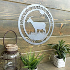 Custom goat metal sign for barns and farmhouses, outdoor décor with goat silhouette and 'Duke’s Family Farm' text on wooden wall with plants and lantern