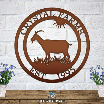 Custom goat metal sign for barns and farmhouses, brown outdoor décor with goat silhouette and 'Crystal Farms' text on white brick wall