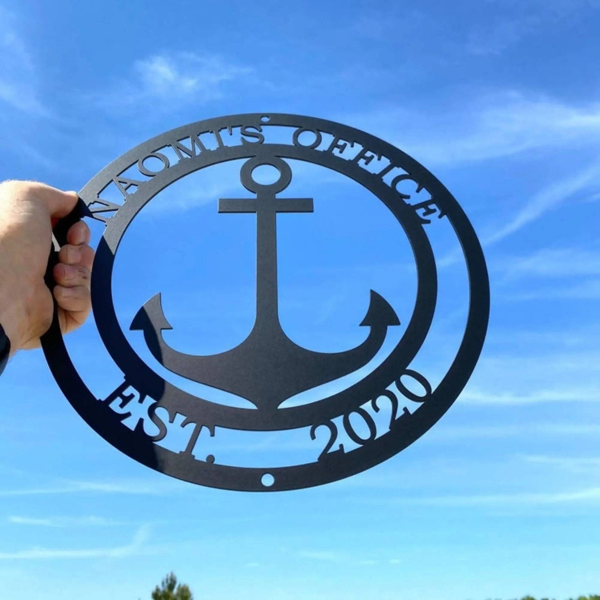 Personalized metal anchor sign with bold font, perfect for boat office or coastal business entry