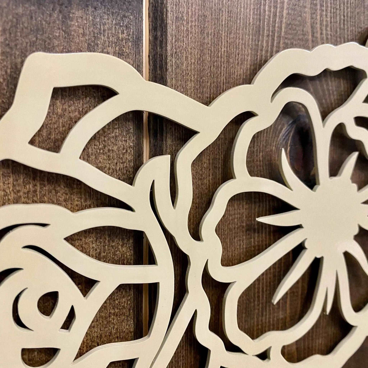Decorative wooden panel with intricate cut-out patterns on wooden background, custom home décor accent, indoor or outdoor decorative wall art