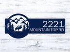 Navy blue metal custom moose sign with mountain and deer design on white wooden background, rustic outdoor cabin decor
