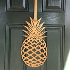 custom-pineapple-wreath-for-front-doors-year-round-welcome-gold-black-door-up-close-house-sensations-art.jpg