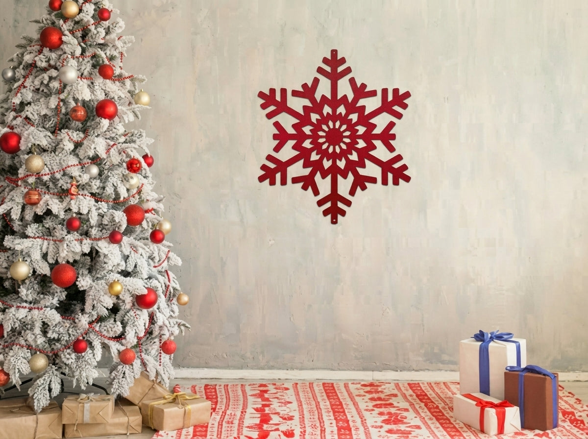 Decorative red snowflake wall decal displayed next to a Christmas tree with presents on a patterned rug, creating a festive and colorful holiday scene.