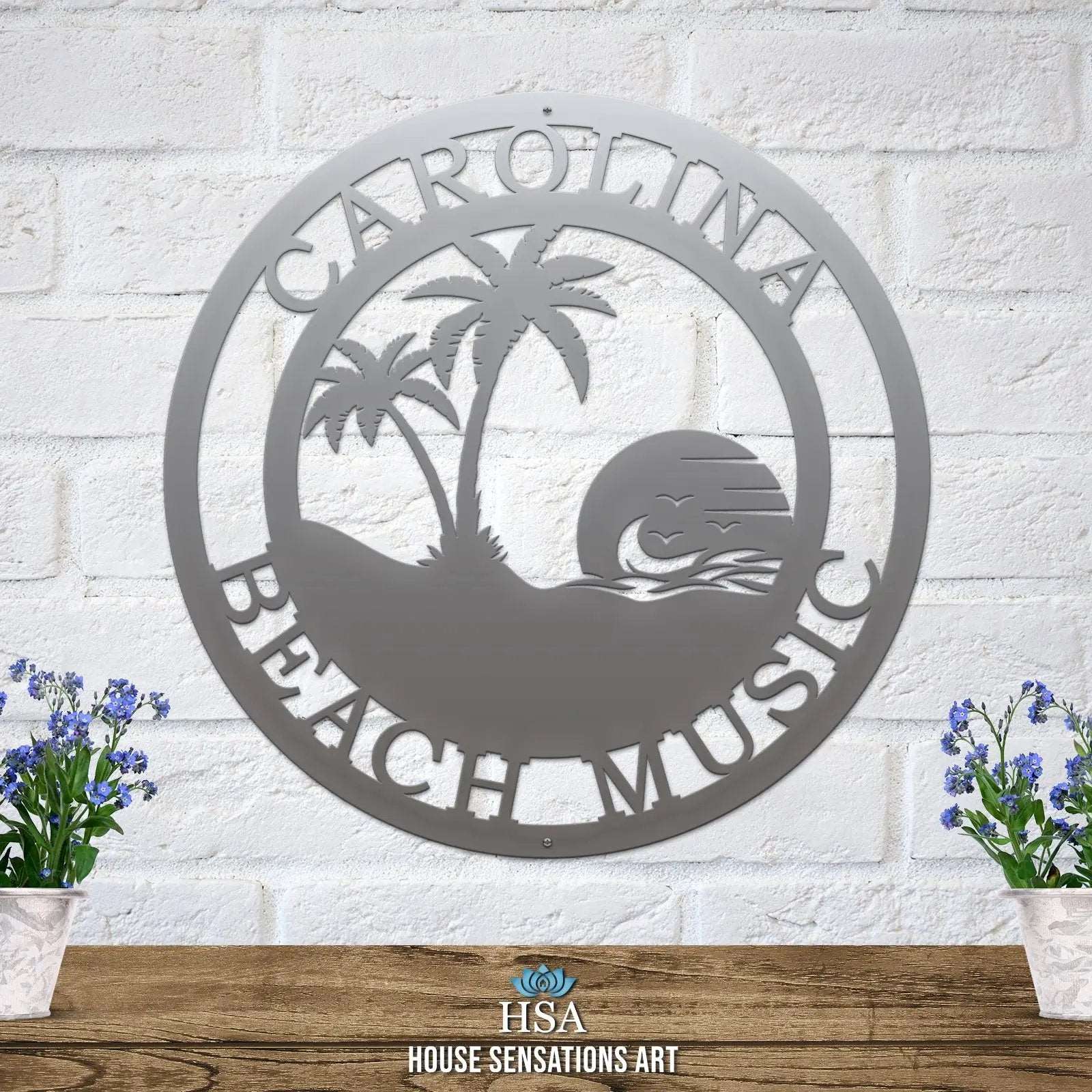Custom tropical sunset metal sign featuring palm silhouettes and personalized text for beach house