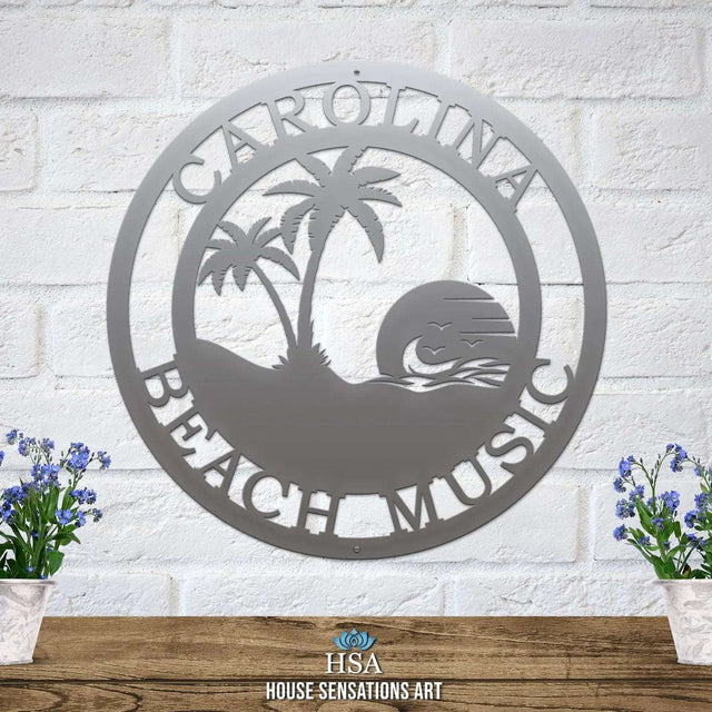 Custom tropical sunset metal sign featuring palm silhouettes and personalized text for beach house