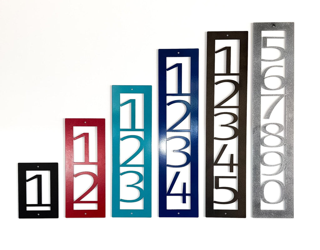Sample set of personalized metal house number plaques in multiple colors, displayed on a white background, ideal for gates, mailboxes, garages, and custom home décor.