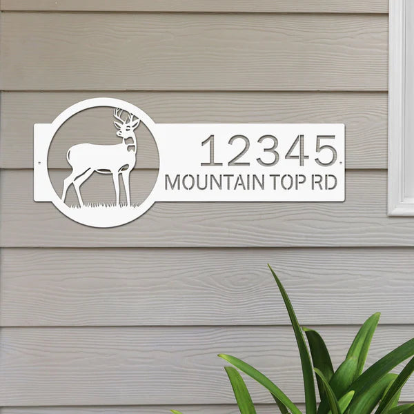 White metal address sign with deer on right and '12345 Mountain Top Rd' on left, bold clear text and rustic style for outdoor use.