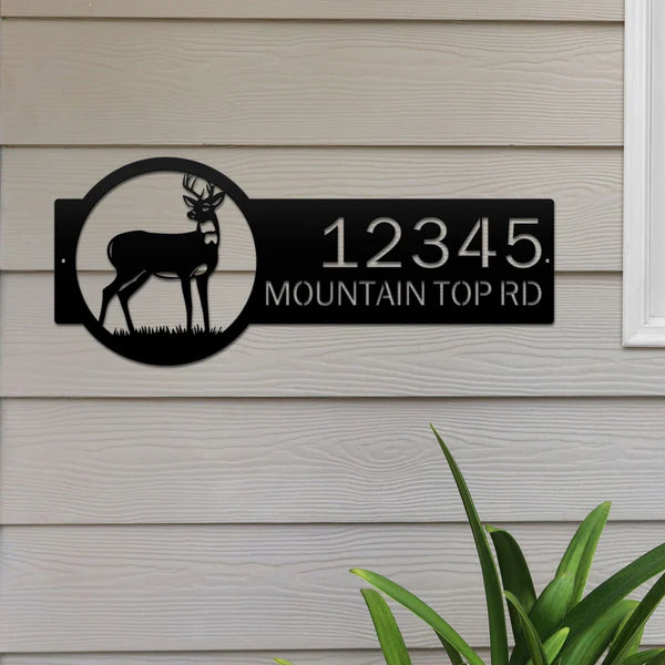 Black bronze metal address sign with deer on right and '12345 Mountain Top Rd' on left in bold rustic design, ideal for outdoor use.