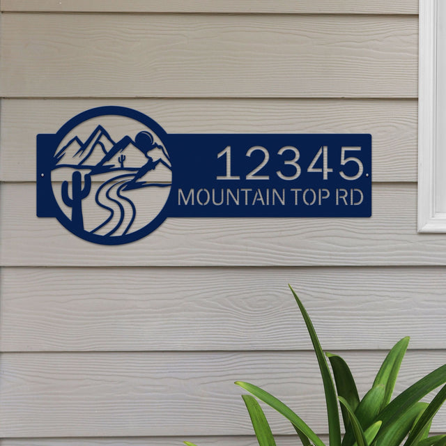 Navy blue Desert Mountain Monogram Address Plaque with mountain, cactus, and rode on right, house number '12345 Mountain Top Rd' left.