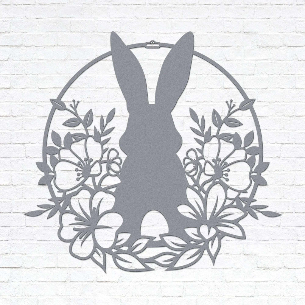 Custom Easter bunny metal wall sign with floral wreath, powder coated outdoor spring décor, rabbit silhouette front door decoration, farmhouse-style Easter wall art on white brick background, pastel seasonal accent