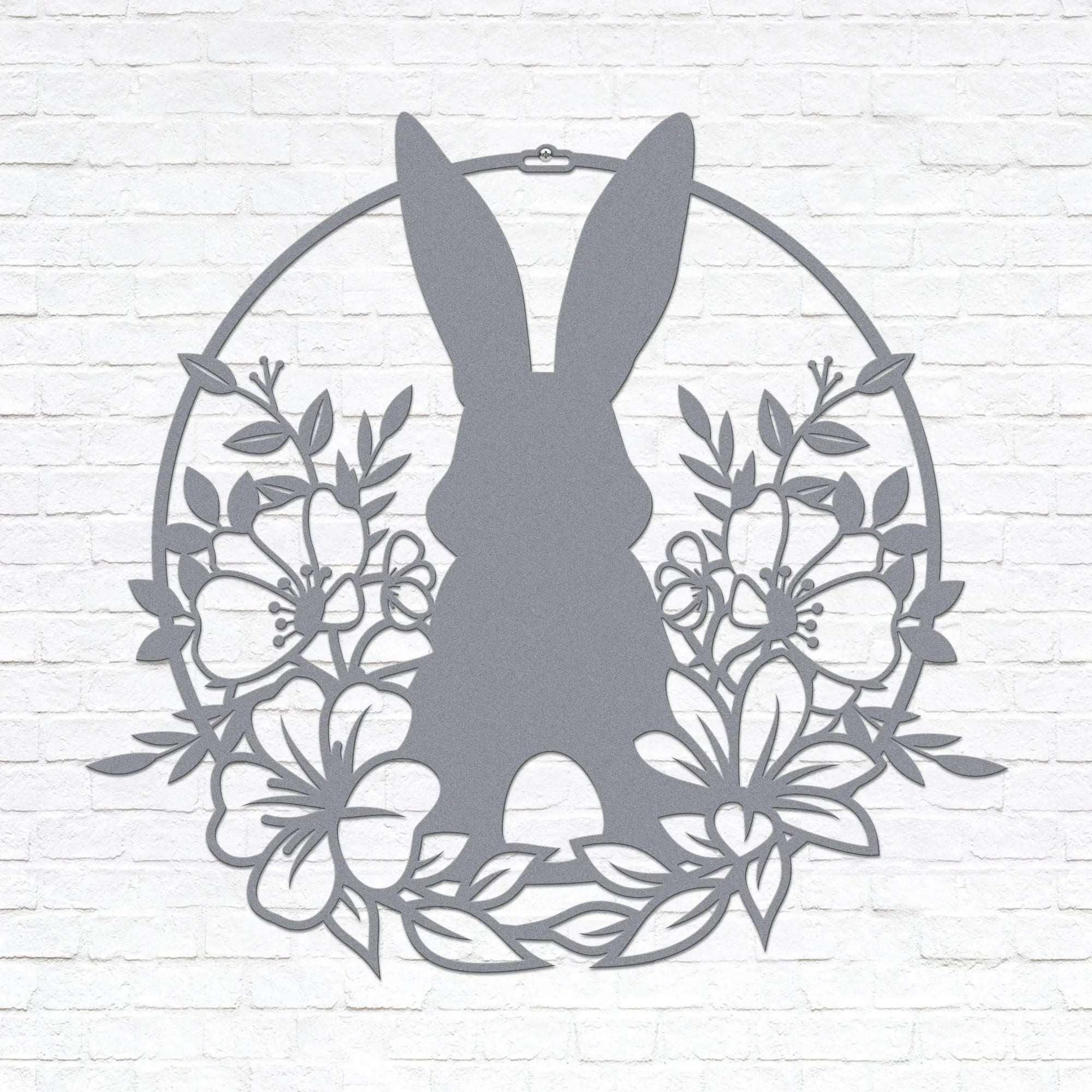Custom Easter bunny metal wall sign with floral wreath, powder coated outdoor spring décor, rabbit silhouette front door decoration, farmhouse-style Easter wall art on white brick background, pastel seasonal accent
