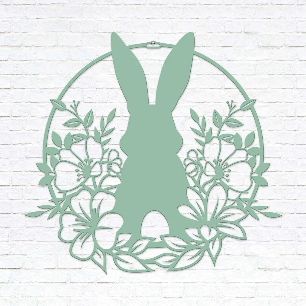 Custom Easter bunny metal wall sign with floral wreath, powder coated outdoor spring décor, rabbit silhouette front door decoration, farmhouse-style Easter wall art on white brick background