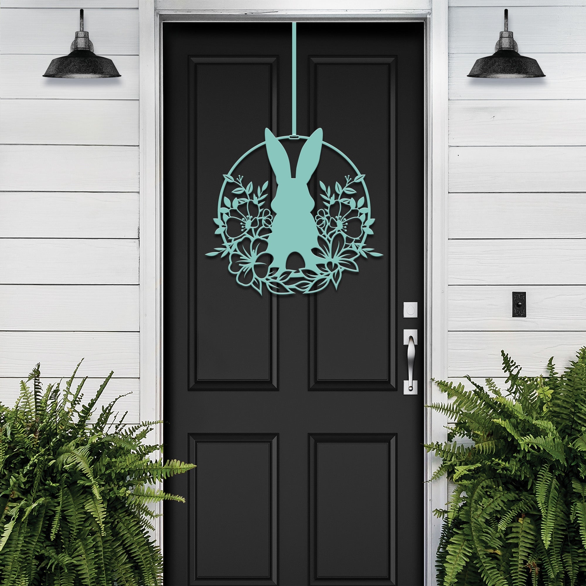 Turquoise Easter bunny metal door sign, custom rabbit silhouette front door décor, powder coated outdoor spring decoration, farmhouse-style Easter porch sign on black door with white wooden wall