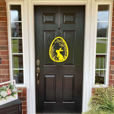 Decorative Easter egg metal door hanger with bunny on dark wooden door, custom outdoor powder coated spring décor, farmhouse front door sign