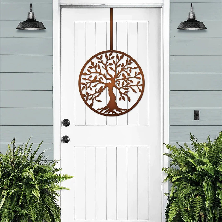 Bronze Tree of Life metal door wreath displayed on a white front door