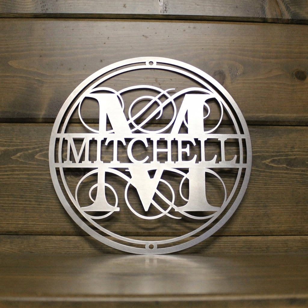 Elegant metal monogram wall sign with "Mitchell," decorative front door outdoor plaque on wooden background, powder coated with HSA logo