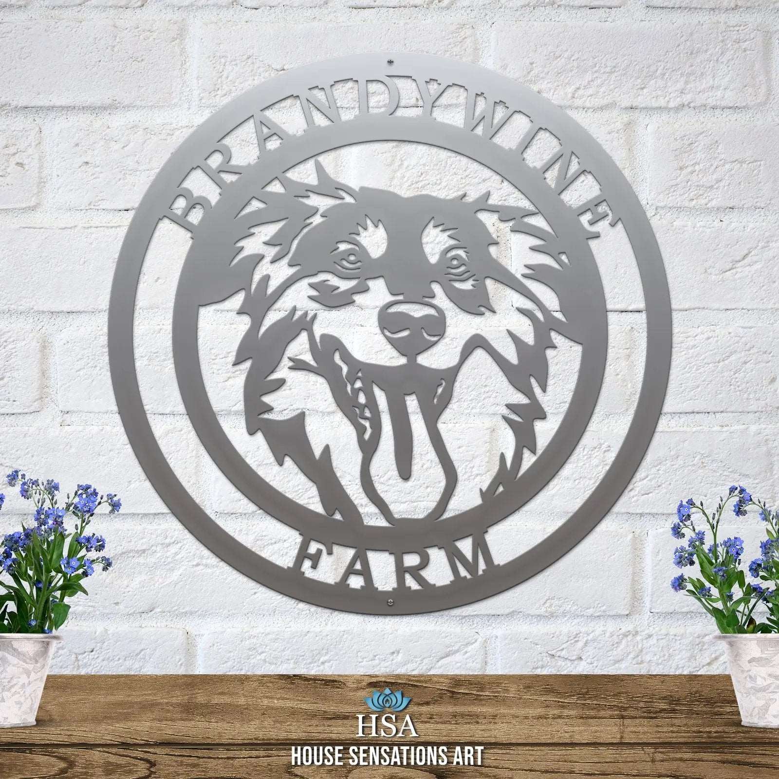 Polished chrome custom laser cut metal ranch sign with dog head silhouette and “BRANDYWINE FARM” text; outdoor farm decor.