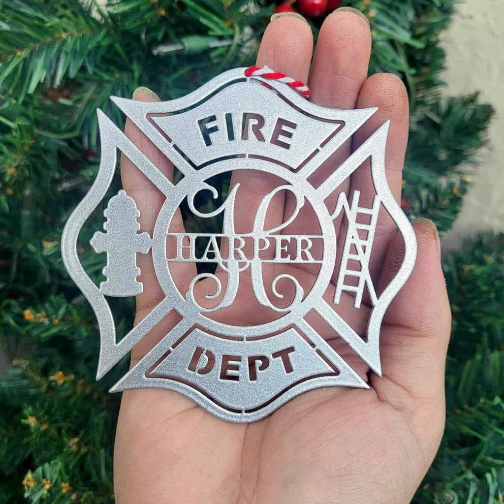Custom firefighter Christmas ornament with FIRE HARPER DEPT text, personalized holiday hero décor hanging in front of a Christmas tree, HouseSensationsArt
