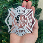 Custom firefighter Christmas ornament with FIRE HARPER DEPT text, personalized holiday hero décor hanging in front of a Christmas tree, HouseSensationsArt