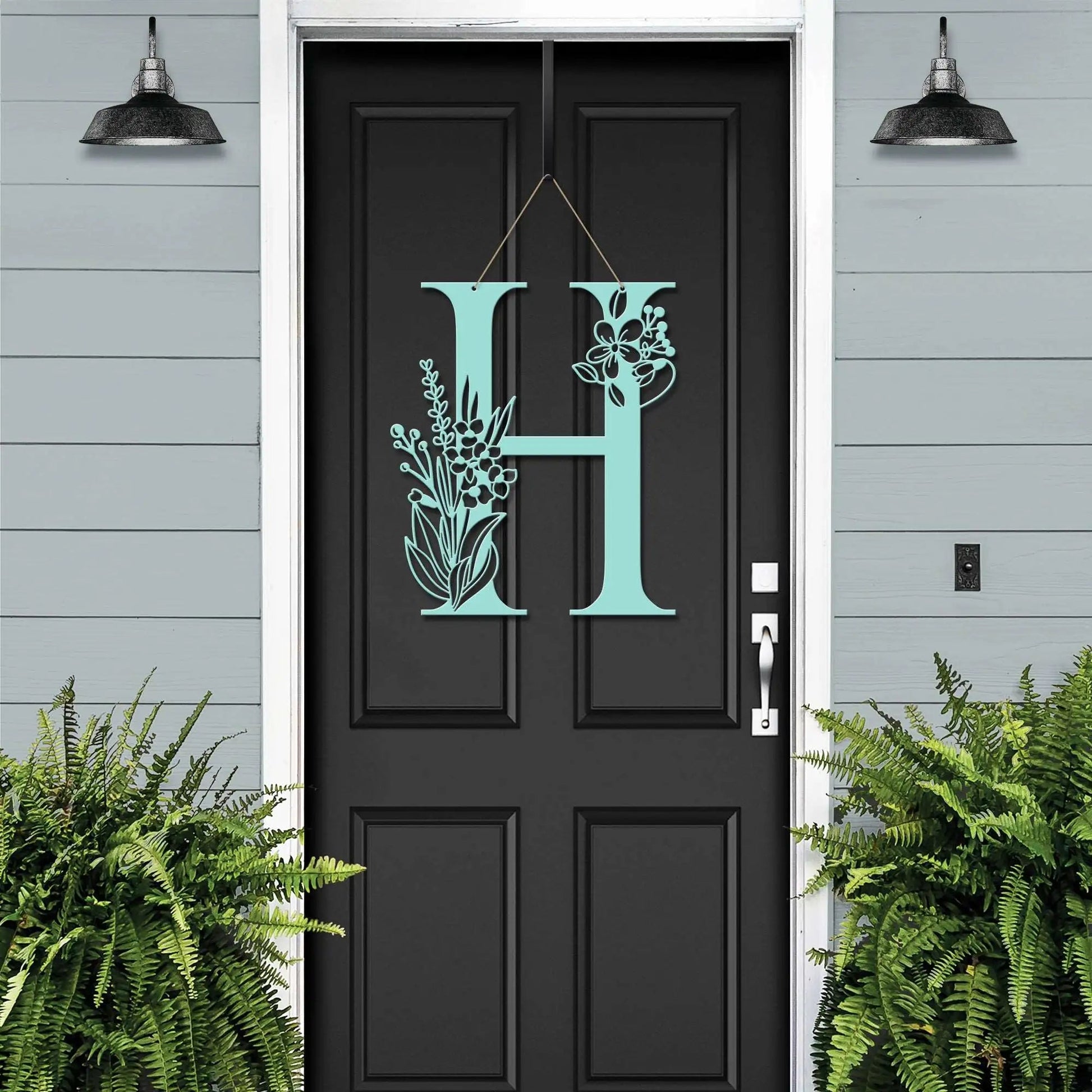 Custom Metal Floral Monogram Door Wreath – turquoise “H” letter sign with floral cutout for vibrant door styling.