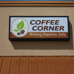Cabinet Sign of "Coffee Corner Brewing Happiness Daily" with a logo on a beige wall.