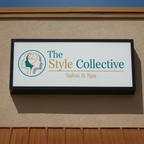 Cabinet Sign for "The Style Collective Salon & Spa" on a building exterior