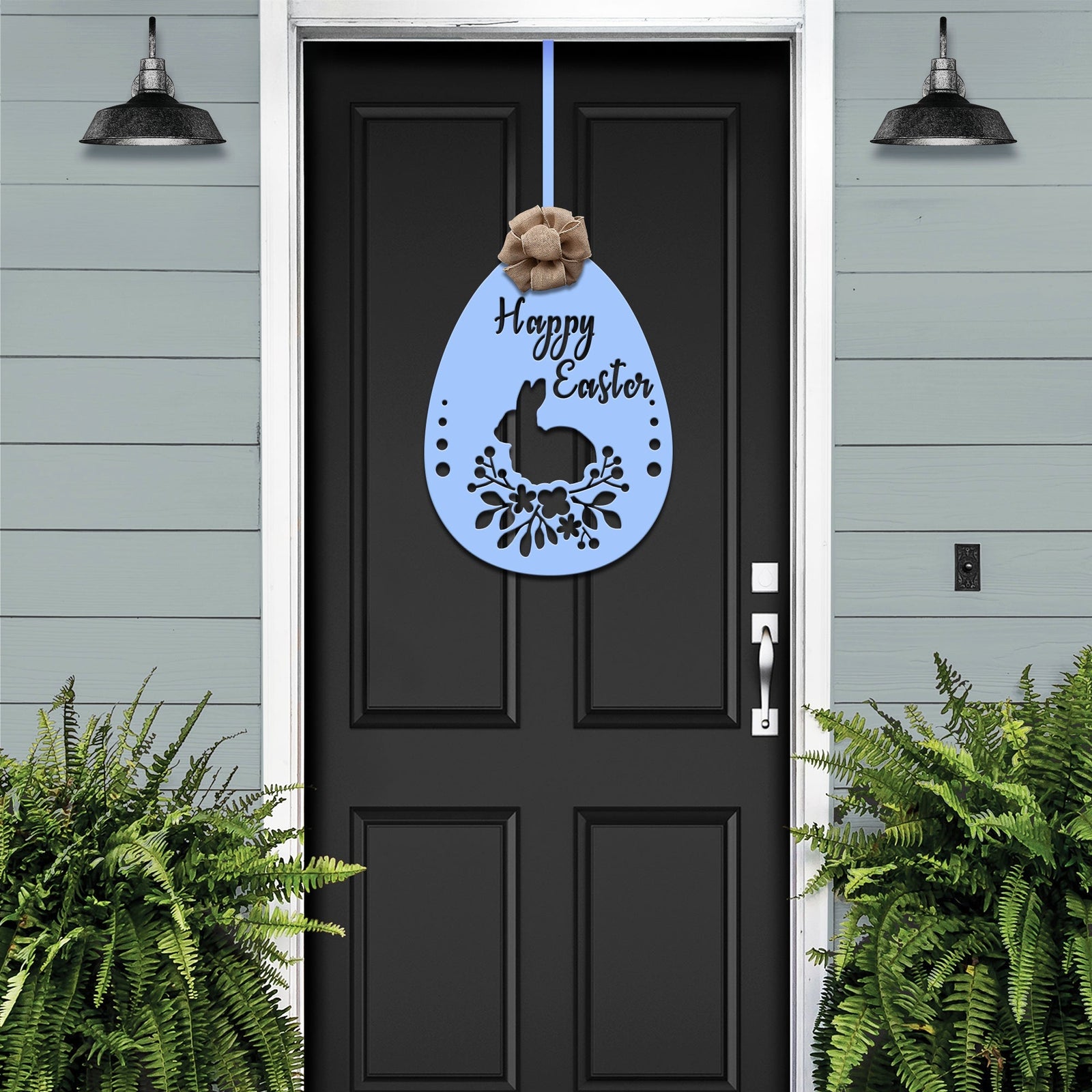 Black front door with light blue Easter egg bunny metal sign, matching blue wall background, seasonal farmhouse décor, custom powder coated welcome entry wall art sign