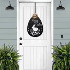 White front door with black Easter bunny metal welcome sign, light blue exterior backdrop, seasonal farmhouse décor, custom powder coated entry wall art sign